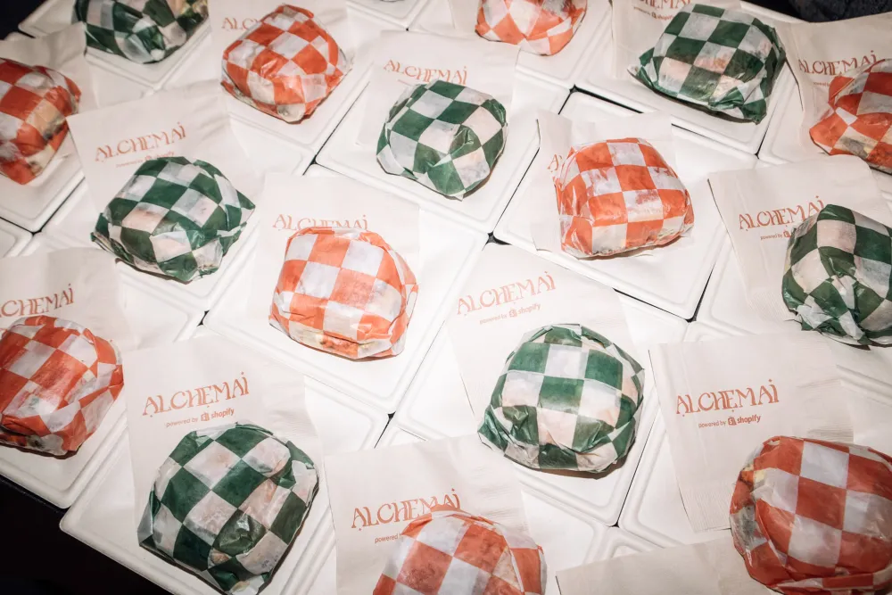 Wrapped 7th Street Burger cheeseburgers prepared for a branded event activation