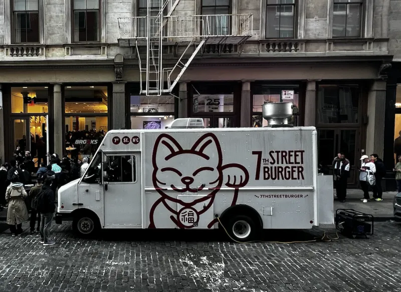 7th Street Burger food truck serving guests at a special event