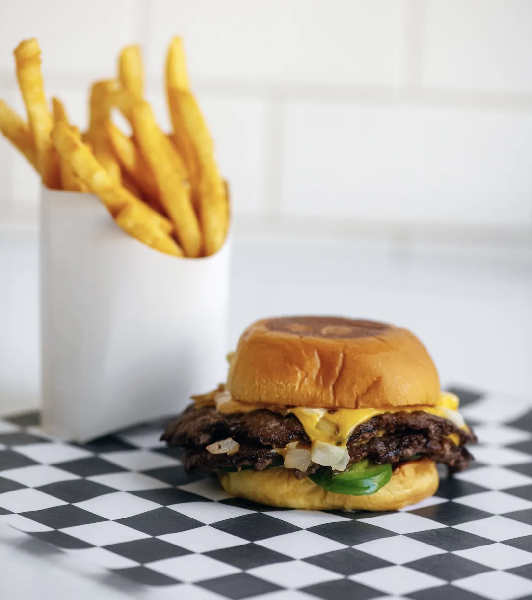 7th Street Burger double cheeseburger served with fries